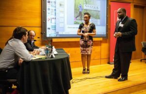 Leah Patterson and Bryan Smith, co-founders of Little Rock's Move Makeup, listen as AVC mentors John Murdock (left) and James Hendren provide feedback at the inaugural Pre-Flight program Pitch Day.
