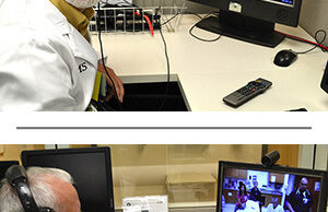 In the UAMS Medical Center&rsquo;s Emergency Department, Randy Maddox, M.D., the department&rsquo;s medical director, works with an x-ray from Chicot Memorial Medical Center in Lake Village during a training session for Chicot Memorial staff.