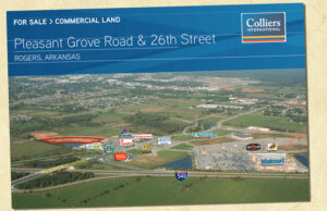 This flyer from Colliers International NWA advertises commerical property for sale at Pleasant Crossing in Rogers.