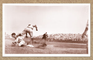 A photograph of Detroit Tigers outfielder and future Hall of Famer Ty Cobb stealing third with a hard slide past the New York Highlanders&rsquo; Jimmy Austin, an iconic asset from the Charles Conlon Collection.