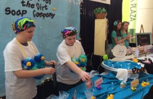 Youth entrepreneurs (from left) Lane Cox, Jayden Hutchison, Christianne Crunkleton and Kaylee Middleton, all from Cotter,&nbsp;display their products at the 2015 YES Expo Day at Park Plaza in Little Rock.