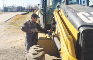 Maintenance at Bearskin Farms, one of many state operations using enhanced, on-site grain storage to improve marketing positions.