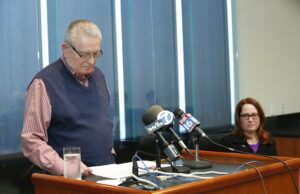 John Glasgow's brother, Roger Glasgow, and his widow, Melinda, at a news conference in Little Rock.