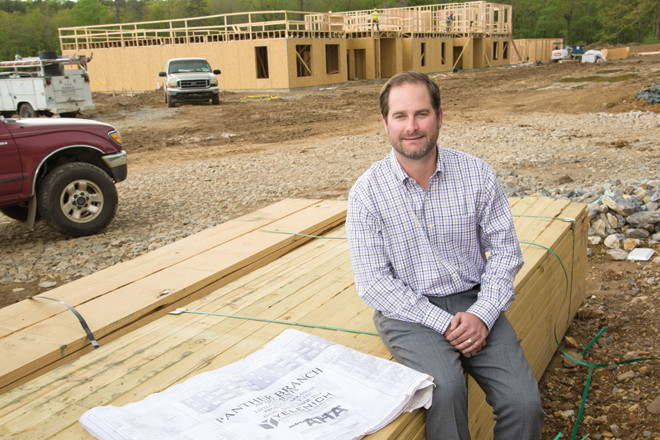 Brandon Huffman, president of Huffman Contractors, is overseeing McKenzie Park Apartments in west Little Rock.