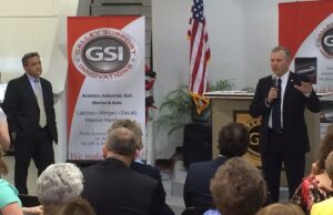 Lt. Gov. Tim Griffin speaks at GSI's expansion with GSI co-owner and COO Wade Radke (standing, left).