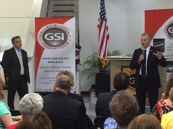 Lt. Gov. Tim Griffin speaks at GSI's expansion with GSI co-owner and COO Wade Radke (standing, left).