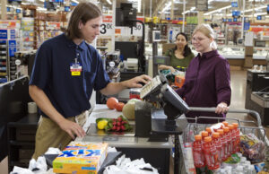 Wal-Mart said it will start paying its U.S. workers at least $9 an hour this month and $10 next year.