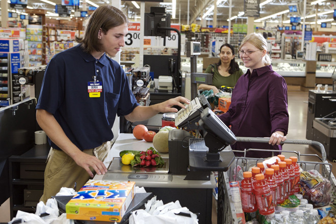 Wal-Mart said it will start paying its U.S. workers at least $9 an hour this month and $10 next year.
