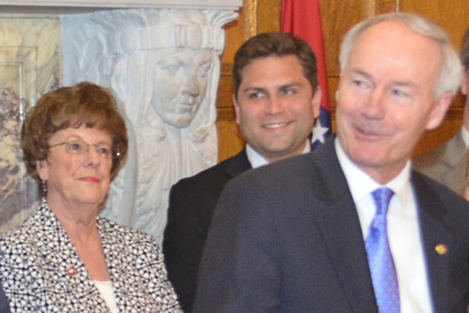Sen. Jane English (R-North Little Rock) looks on with Senate President Pro Tempore Jonathan Dismang (R-Searcy) as Gov. Asa Hutchinson makes remarks after signing a series of workforce education bills into law.