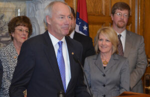 Governor Asa Hutchinson speaks after signing into law three workforce bills into law. From left: Sen. Jane English (R-North Little Rock); Gov. Hutchinson;&nbsp;(obscured) Senate President Pro Tempore Jonathan Dismang (R-Searcy);Dr.&nbsp;Charisse Childers, director of the Department of Career Education; and Johnny Key, director of the Department of Education.