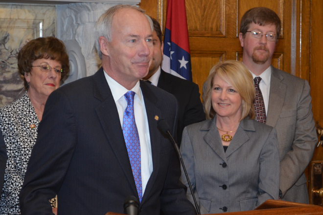 Governor Asa Hutchinson speaks after signing into law three workforce bills into law. From left: Sen. Jane English (R-North Little Rock); Gov. Hutchinson;&nbsp;(obscured) Senate President Pro Tempore Jonathan Dismang (R-Searcy);Dr.&nbsp;Charisse Childers, director of the Department of Career Education; and Johnny Key, director of the Department of Education.