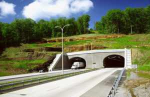 A truck emerges from the Bobby Hopper Tunnel, heading south on Interstate 49 near Fayetteville.