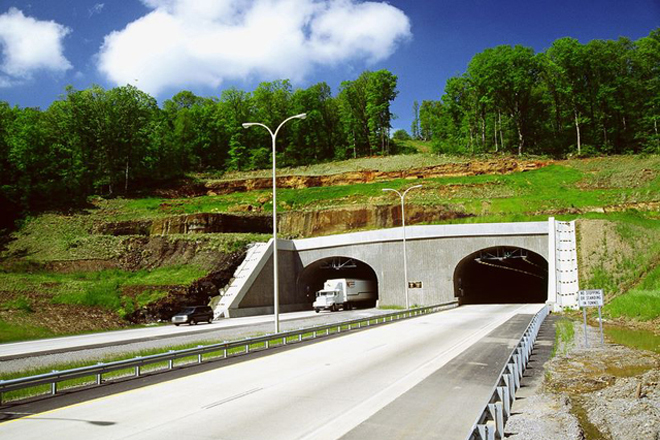 A truck emerges from the Bobby Hopper Tunnel, heading south on Interstate 49 near Fayetteville.
