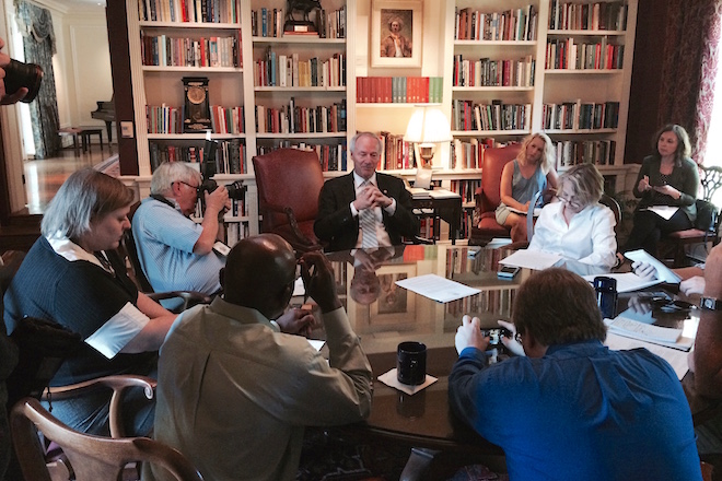 Gov.&nbsp;Asa Hutchinson talks to reporters about his trip to Europe.