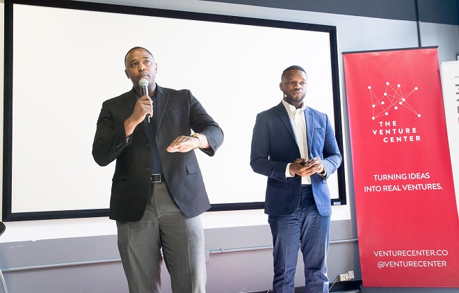 Steadmon Harper (left) and Bjorn Simmons of Wyzerr answer questions from the crowd following their 1 Million Cups pitch.