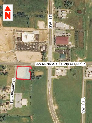 A recently purchased tract of land (shaded above) facing a Walmart Neighborhood Grocery may soon see development of a 12,000-SF shopping center.