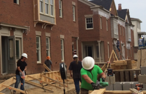 Workers for Thornton Commercial Builders work on the Village Flats project, part of the Village at Hendrix across from Hendrix College in Conway. The project will entail&nbsp;office and retail space on the ground floor and&nbsp;apartments above.