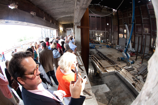 Visitors peek inside the $70 million renovation of Robinson Center Music Hall in Little Rock on Wednesday.