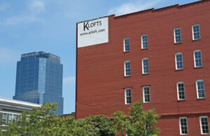 Scott Reed’s 42,000-SF K Lofts project at 315 Main St., above, and the 3-building, 125,000-SF Main Street Lofts  project at 510-524 Main St. have drawn lien claims for unpaid work by contractors. The historic redevelopments in downtown Little Rock also are many months behind schedule  with unfinished construction remaining.