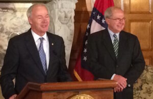 Gov. Asa Hutchinson and new Chief Justice&nbsp;Howard Brill.