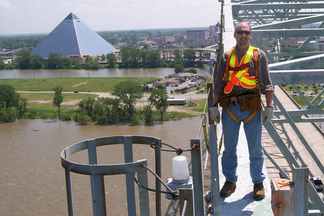 Mike Hill, the heavy-bridge maintenance engineer for the Arkansas Highway & Transportation Department, on the Hernando de Soto Bridge that carries Interstate 40 across the Mississippi River.