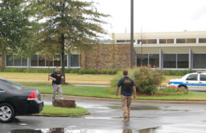 Federal agents serve a search warrant in North Little Rock.