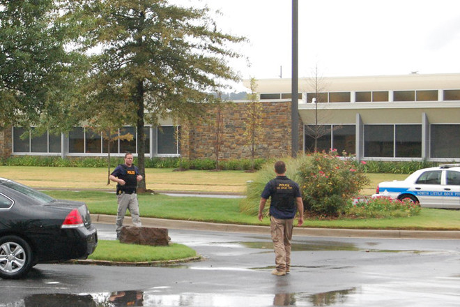 Federal agents serve a search warrant in North Little Rock.