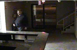 In court filings, receiver Michael McAfee says security camera footage shows John Rogers entering the archive offices late one night against the terms of a lease agreement. Above, a screenshot from the footage.