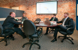 Phyzit team members (from left) Stewart Whaley, L.J. Wilson, Aaron Pilkington and Keith Moore at the firm's River Market office.