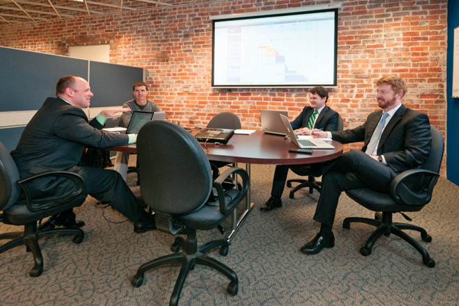 Phyzit team members (from left) Stewart Whaley, L.J. Wilson, Aaron Pilkington and Keith Moore at the firm's River Market office.