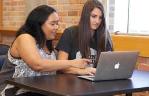 Iron Yard graduate Jacklyn Carroll, left, and Mary Dunlap, director of the Iron Yard’s Little Rock campus.