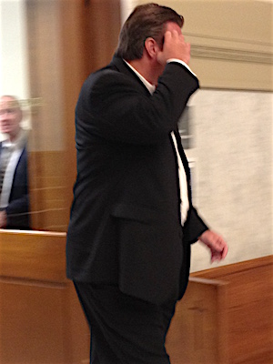 John Rogers leaves&nbsp;Pulaski County Circuit Court after lawyers&nbsp;argued a request for a contempt hearing.