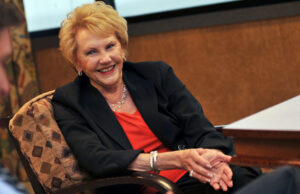 Johnelle Hunt holds a $14.7 million default judgment against One Bank&rsquo;s parent company.