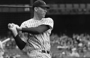 Bill Dickey, New York Yankees catcher and a namesake of Dickey-Stephens Park in North Little Rock, hits warmup in a 1938 photo by Charles M. Conlon.
