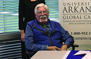 Heather Sprandel with the UA Global Campus and Doug Carter, owner of Mid-America Truck Driving School.