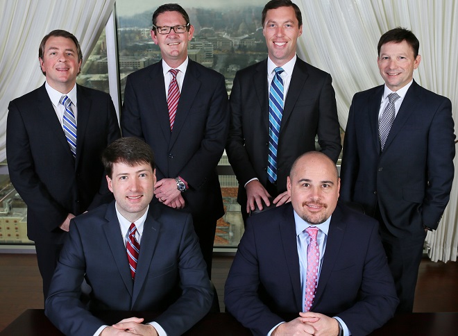 The attorneys of Steel, Wright & Collier: (top row, from left) Winston Collier, Marshall Wright, Nate Steel, Scott Poynter, (seated, from left) Alex Gray and Jeremy Hutchinson.