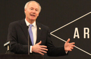 Gov. Asa Hutchinson speaks to attendees at the Arkansas Economic Developers’ winter conference about Arkansas Inc. Thursday in Little Rock.