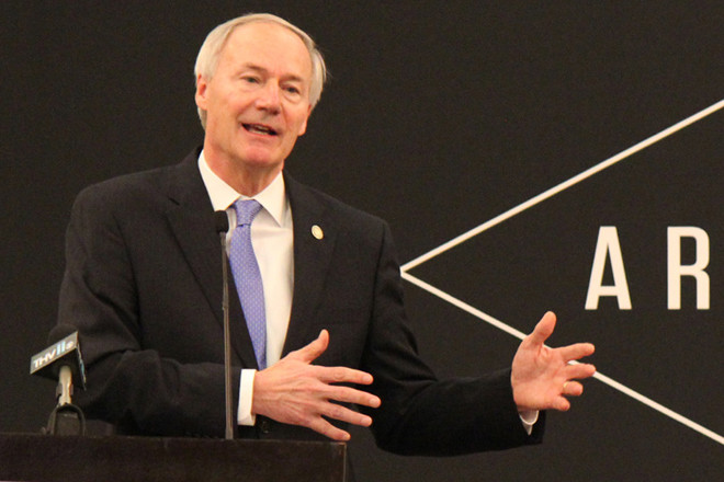 Gov. Asa Hutchinson speaks to attendees at the Arkansas Economic Developers’ winter conference about Arkansas Inc. Thursday in Little Rock.