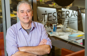 Dave Fredrick stands outside the Tesseract Center on the University of Arkansas campus.  “This is going to be ubiquitous,” he says of game design.