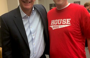 Gov. Asa Hutchinson (left) and House Speaker Jeremy Gillam at last year's Hoops for Kids' Sake basketball game.