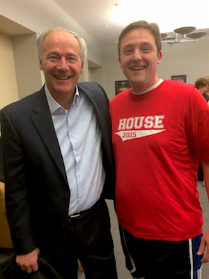 Gov. Asa Hutchinson (left) and House Speaker Jeremy Gillam at last year's Hoops for Kids' Sake basketball game.