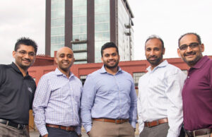 At the Hilton Garden Inn site are Chet Patel, Pinnacle Hotel Group president; Shawn Govind, director of development; Roshan Patel, development coordinator; Rocky Govind, director of construction and asset management; and Nayan Nagin, director of purchasing and procurement.