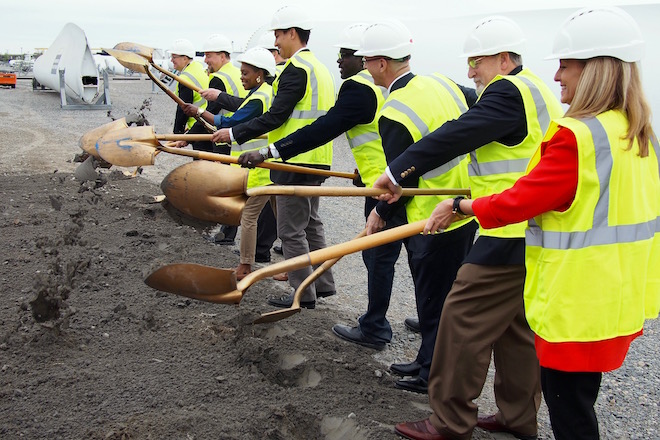 Company officials and representatives from the city of Little Rock the Little Rock Regional Chamber break ground on a 44,000-SF warehouse for LM Wind Power at Little Rock Port.
