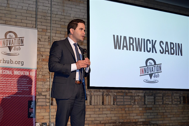 Warwick Sabin speaking during demo day at the Arkansas Regional Innovation Hub in North Little Rock.