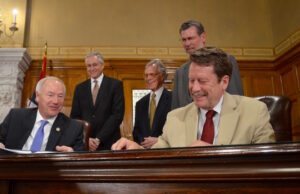 From left: Gov. Asa Hutchinson, Dan Rahn, Jerry Adams, William Slikker Jr. and&nbsp;Robert M. Califf.