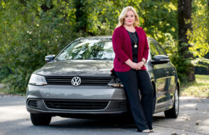 Allison Koile, attorney for Brooke Johnson, stands by Johnson’s Volkswagen Jetta diesel. Johnson is one of the Arkansas plaintiffs in the class-action lawsuit against Volkswagen.