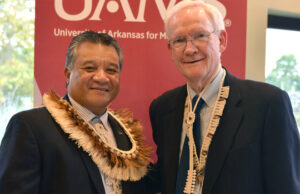 Sheldon Riklon, M.D., and Peter Kohler, M.D., vice chancellor of the northwest University of Arkansas for Medical Sciences campus, following Riklon&rsquo;s investiture into the distinguished professorship that bears Kohler&rsquo;s name.