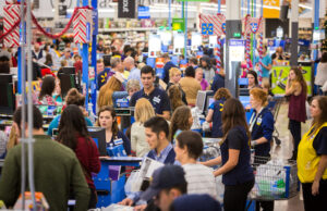 Shoppers at checkout lines during Wal-Mart's 2015 Black Friday event.