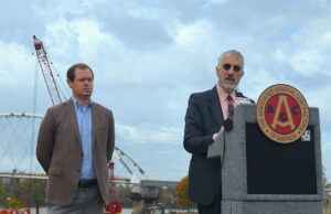Kenneth Simonson, chief economist for&nbsp;the Associated General Contractors of America, speaks Tuesday in North Little Rock as&nbsp;Thomas Dickinson, incoming president of the Arkansas AGC and general manager of McGeorge Contracting Co. in Little Rock, looks on.&nbsp;