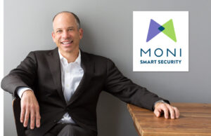 Martin Thoma, principal of Thoma Thoma, shown with the brand name and logo for MONI.